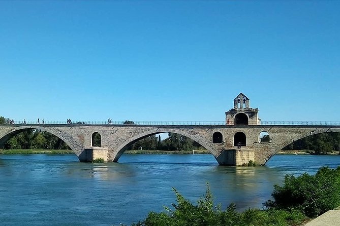 Avignon Walking Tour including Pope's Palace - Entering Palais des Papes: Gothic scale and papal daily life