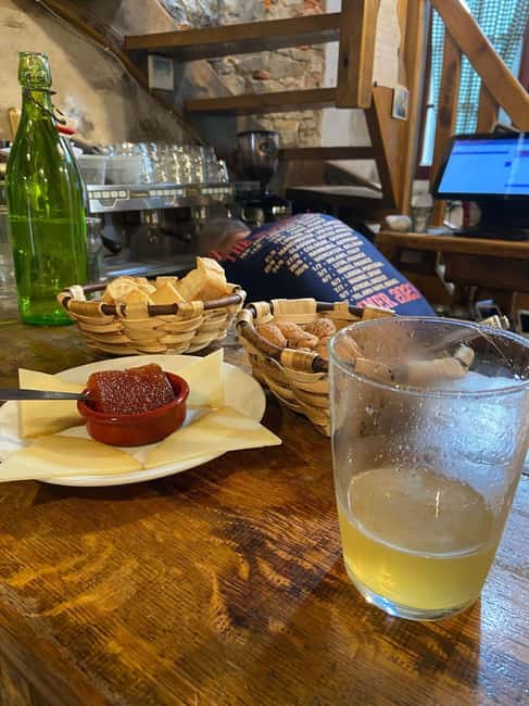 Bayonne: Guided Food Walking Tour (with Food and Drinks) - Basque cider house ritual: sagarnoa straight from the barrel