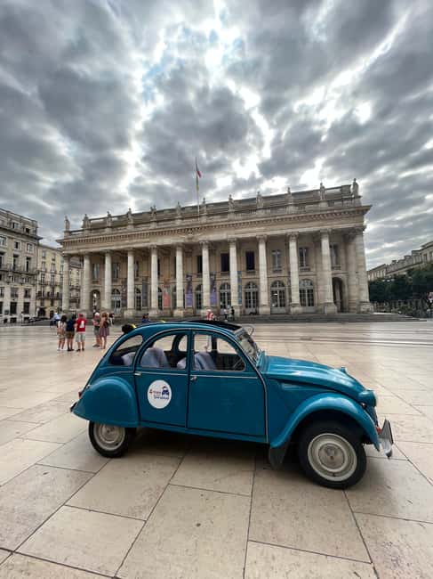 Bordeaux: Private Tour in a Citroën 2CV - Palais Gallien and Place des Quinconces: big space moments