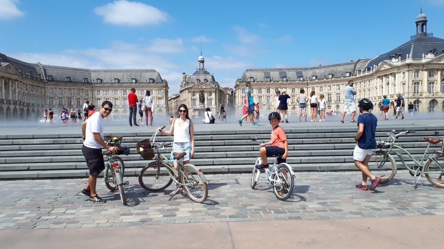 Bordeaux: Top Landmarks & Historic Bike Tour - Chartrons, the wine trade district feeling, and why cellars matter