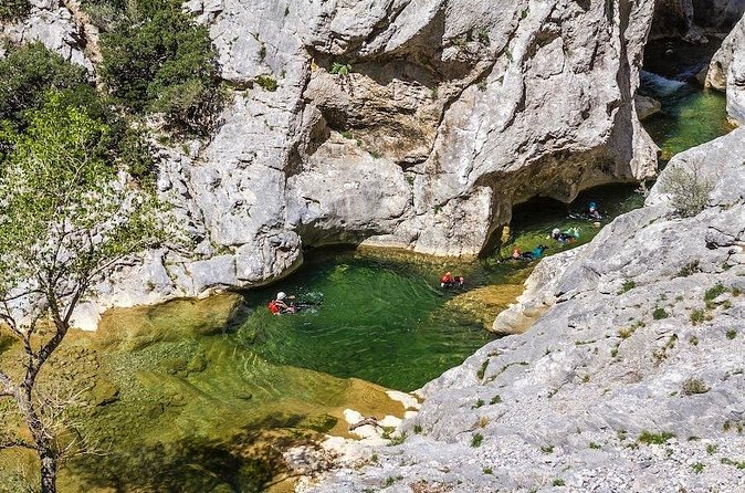 Canyoning descent of the Galamus Gorge - Inside the canyon: turquoise pools, toboggans, and optional jumps