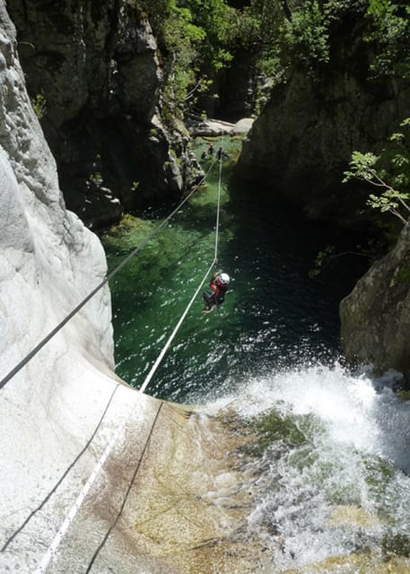 Corte Region: Fun Canyoning Verghellu - The canyon action: jumps, natural slides, and the zip line into pools