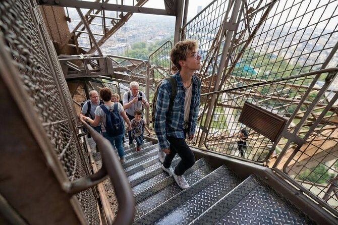 Eiffel Tower Climbing Tour with Optional Summit with Elevator - The second tier: guided architecture talk paired with real city views