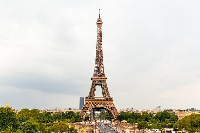 Eiffel Tower Guided Tour by Stairs with Optional Summit by Lift - Stop 1: first-floor access and the tower story you don’t get alone