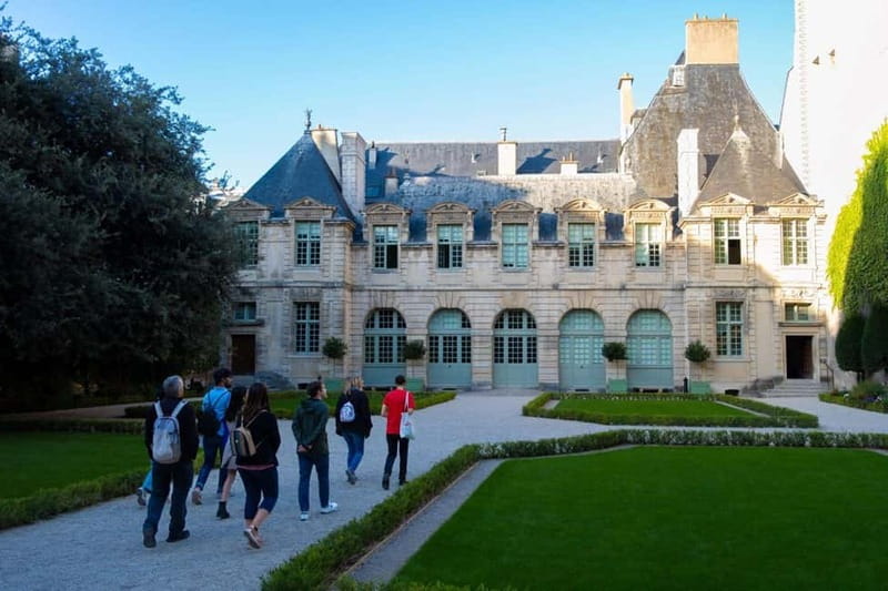 Explore the Marais: History, Art & Local Culture - Place de la Bastille: French Revolution in street-level scenery