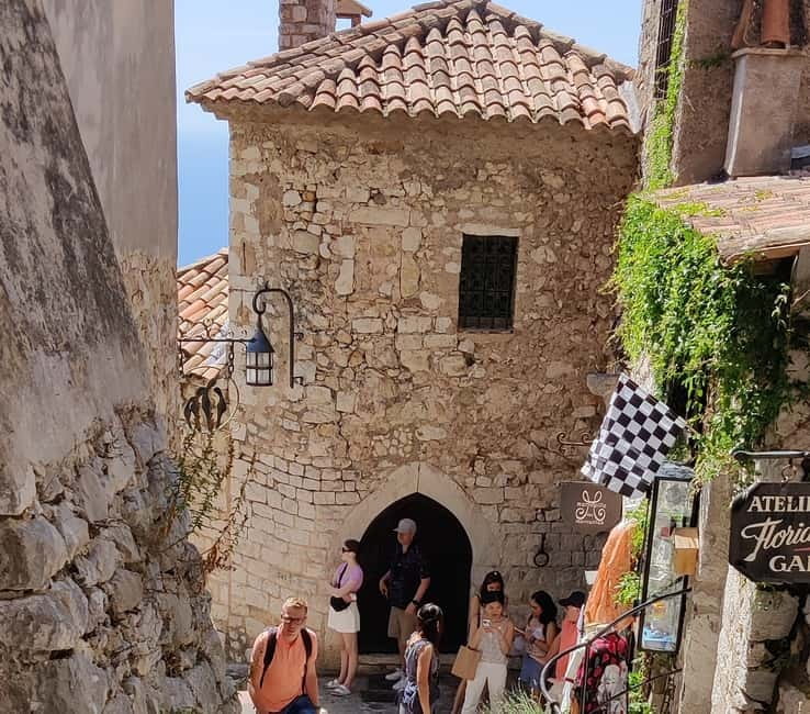 Èze: Walking Tour with a Certified Local Guide - Notre-Dame-de-l’Assomption: ochre facade and the bell tower clock