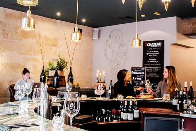 French Wine and Champagne Tasting in Paris - Bread, water, and the optional cheese or charcuterie upgrade