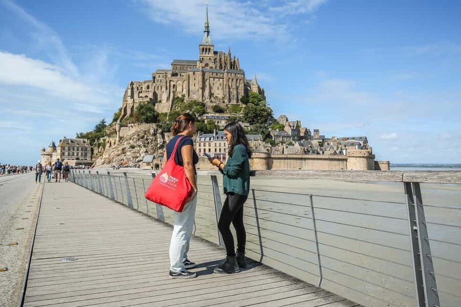 From Paris: Full-Day Mont Saint-Michel Guided Tour - Arriving at Mont Saint-Michel: the village first, then the Abbey