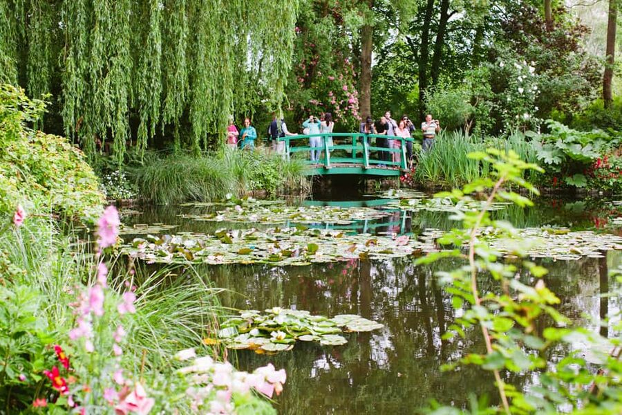 From Paris: Monet Garden & Giverny Bike Tour and Picnic Stop - Coach ride through Normandy: scenery with a story, not just sitting