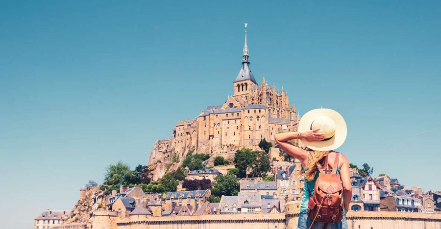 From Paris: Mont Saint Michel Day Trip with a Guide - The 4.75-hour coach ride each way, with commentary and real breaks