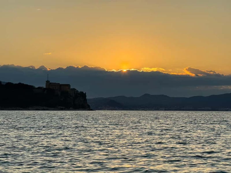 Golf Juan: Sunset Sailing Cruise with aperitif at the Island - Lérins Islands guided cruising: stories, views, and photo stops