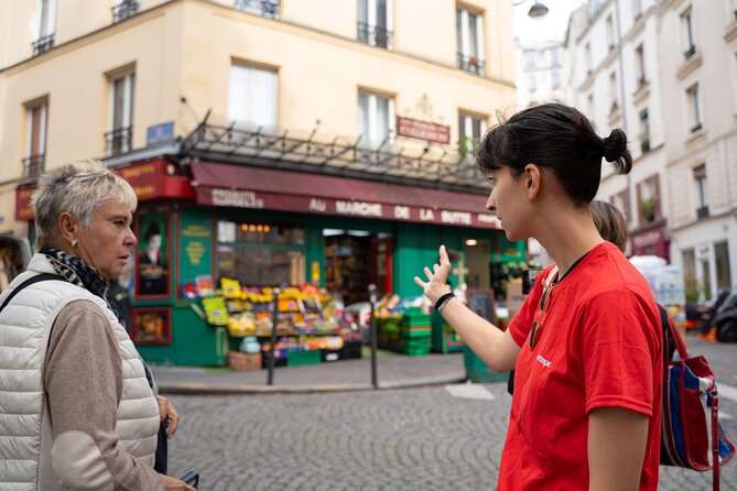Hidden Montmartre: Paris' Secret Streets Walking Tour - Le Moulin de la Galette, windmill views, and a secret passage for the best angle