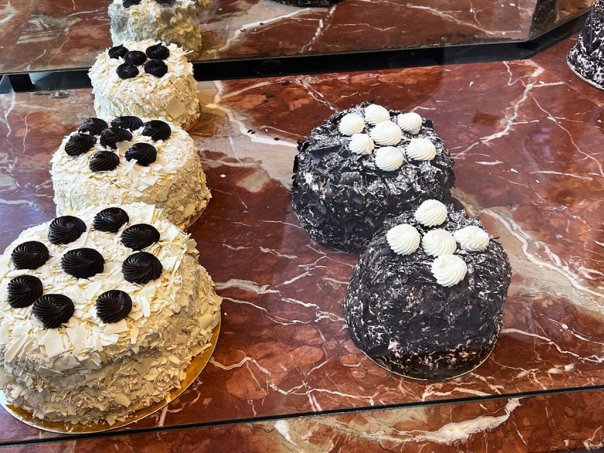 Le Marais Walking Food Tour with Cheese, Wine & Pastries - Who should book this Le Marais cheese, wine, and pastry tour?
