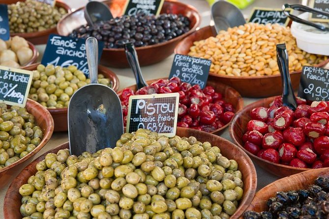 Luberon Market & Villages Day Trip from Aix-en-Provence - Roussillon and Lourmarin: free exploration with market days on Thursday and Friday