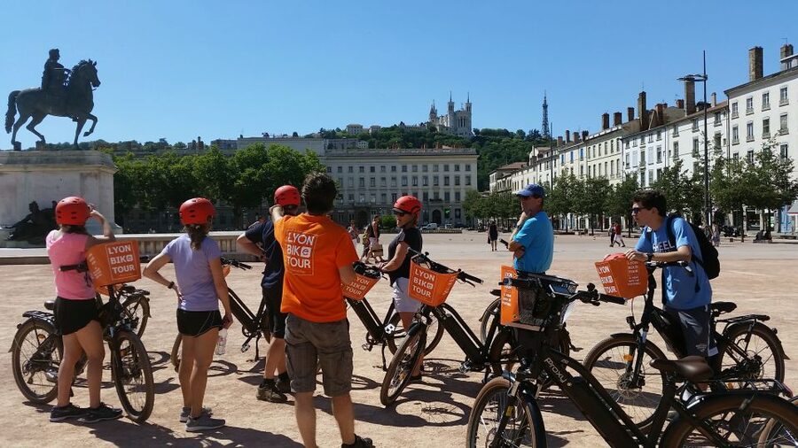 Lyon: 2-Hour Electric Bike Tour with a Local Guide - Place Bellecour and Place des Terreaux: squares that tell you Lyon’s mood