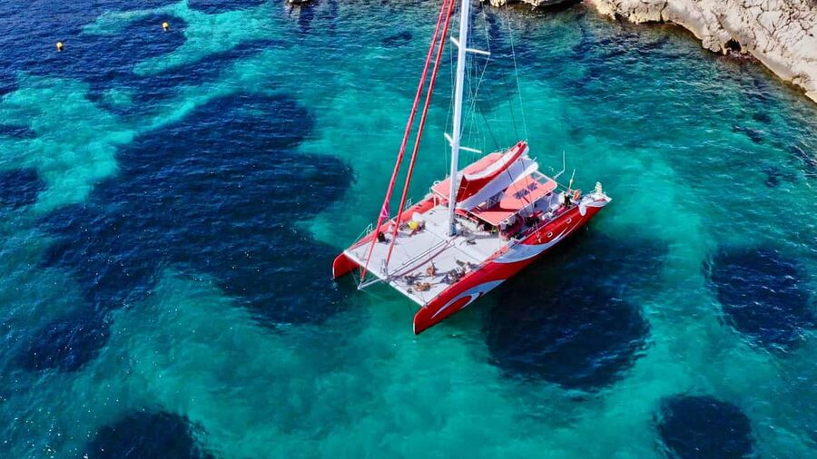 Marseille : Calanques Catamaran Cruise with Lunch & Wine - Riou Archipelago: the first big swim, photo stop, and guided look
