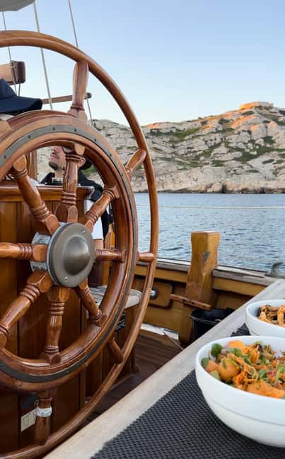 Marseille: Evening sailboat trip to the Calanques du Frioul with buffet and organic wine - Frioul archipelago: anchoring in a wild cove for swim and snorkel time
