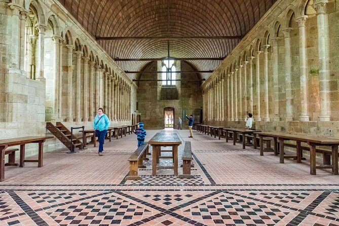 Mont Saint Michel Day Trip from Paris with English Speaking Guide - Abbey du Mont Saint Michel: dress code and using the audio app well