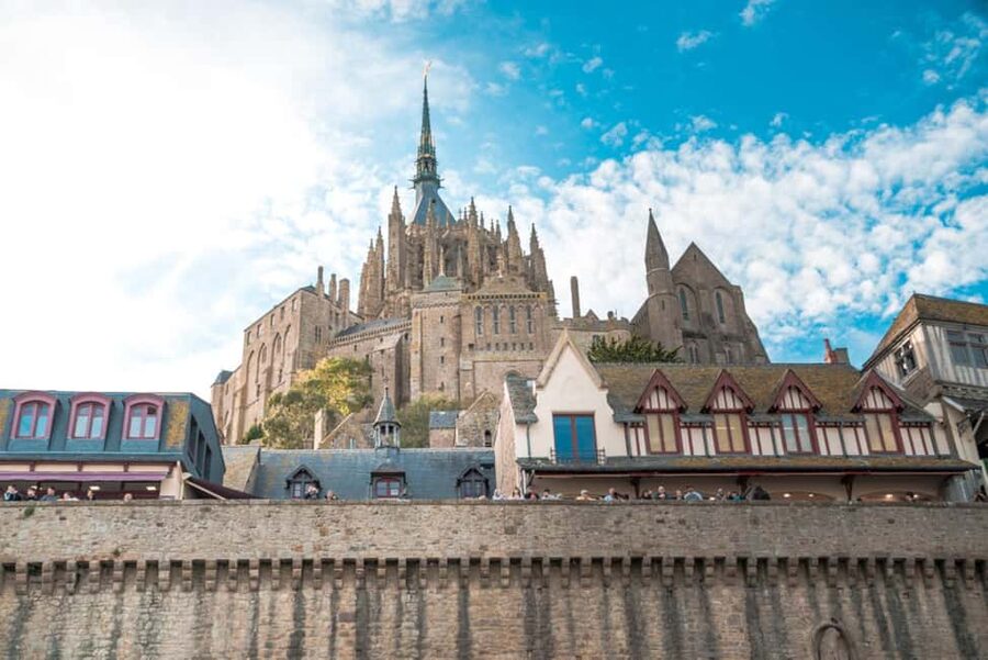 Mont Saint-Michel Small-Group Day Trip from Paris with Abbey Ticket - Causeway to fortified village: where the tides become a lesson