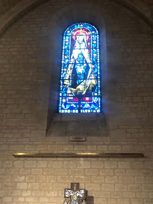 Montmartre for Art Lovers - Walking tour with Expert Guide - Place du Tertre and Saint-Pierre de Montmartre: finishing the artist loop