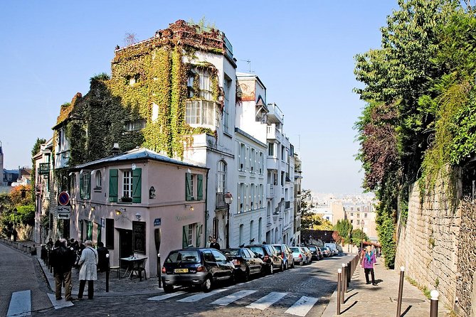 Montmartre Hidden Gems and Scenic Highlights Walking Tour - Le Passe-Muraille, Dalida, and why the quiet squares matter