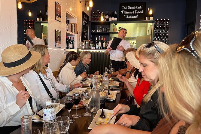 Montmartre Hill French Gourmet Food and Wine Tasting Walking Tour - Stop-by-stop tastings: savory, sweet, and wine pairing