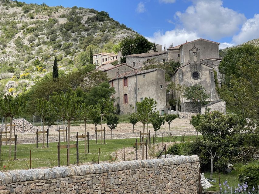 Montpellier: Visit Cirque of Navacelle and its medieval mill - Navacelles village waterfall time, stone streets and a slower pace
