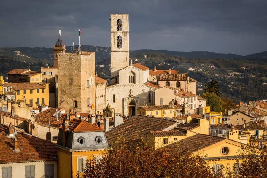 Nice: Medieval Villages Full-Day Guided Trip - Tourettes-sur-Loup: ramparts, violet flower spots, and a lunch stop vibe