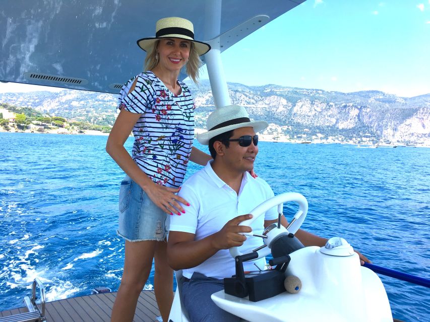 Nice: Private French Riviera Solar Boat Cruise - Onboard feel: silent electric power, cork deck, and steering time