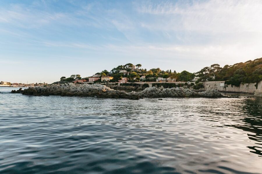 Nice: Private Sunset Tour on Solar Powered Boat - Villa David Niven Mooring and the Yacht Harbors at Dusk