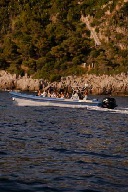Nice: Sunset Boat Tour with Wine and Local Snacks - Niçois snacks and wine on the water: the local flavor piece that makes it feel real