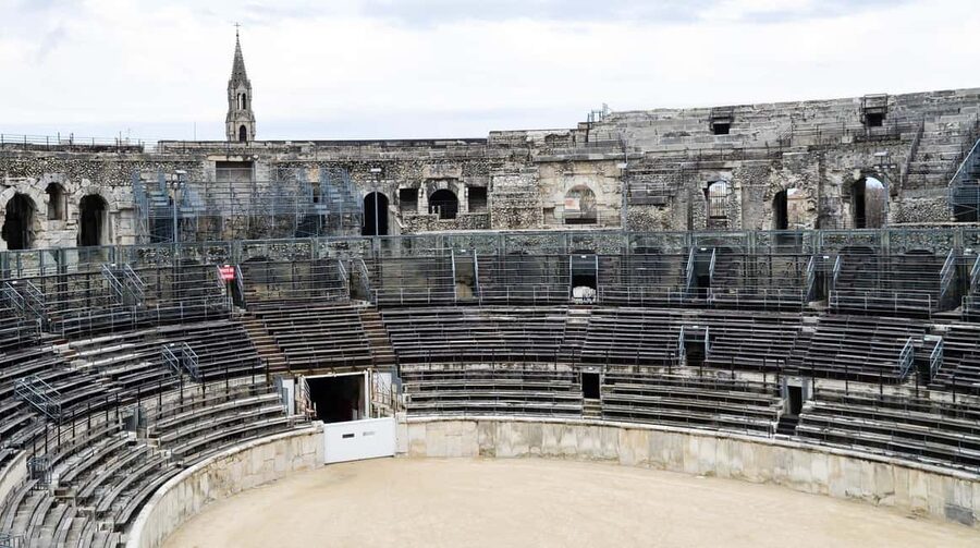 Nimes: Ancient Roman Arena Ticket & Old Town Audio Tour - Stepping Into Nimes Amphitheatre: Where You Start