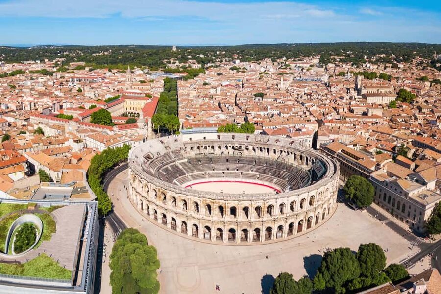 Nimes: Ancient Roman Arena Ticket & Old Town Audio Tour - Following the Audio Through Gladiator Spaces and Exhibitions