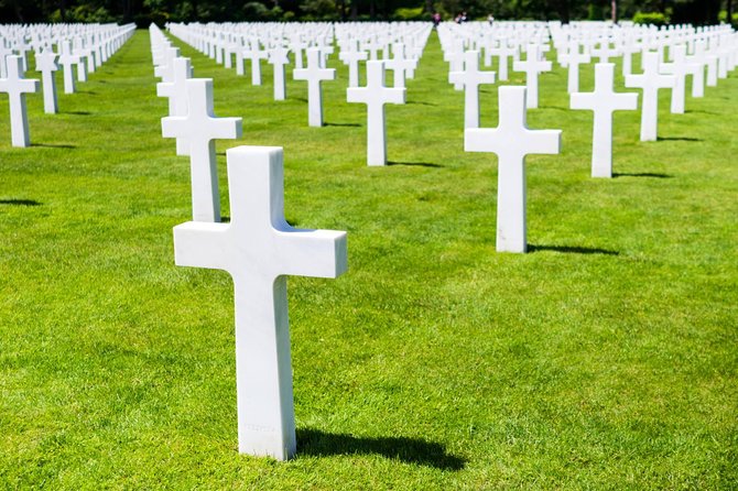 Normandy D-Day Small-Group Day Trip with Omaha Beach, Cemetery & Cider Tasting - Pointe du Hoc: craters, a cliff, and a mission with no easy landing