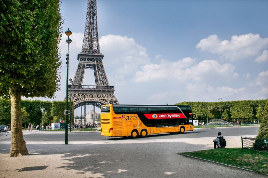 Paris: Audio-Guided Bus Tour & Seine River Cruise - The cruise on the Seine: why glass and music matter