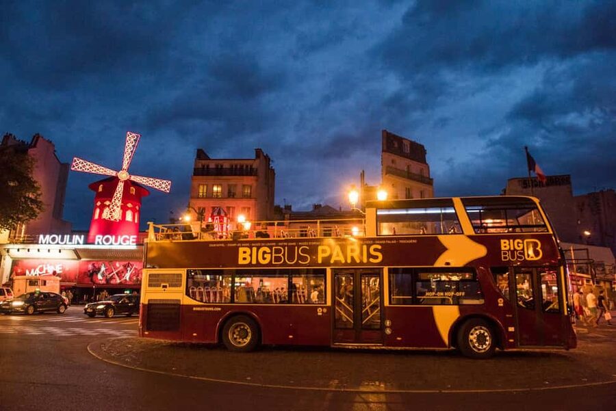 Paris: Big Bus Panoramic Night Tour by Open-Top Bus - Moulin Rouge area: the nightlife lights without the walking