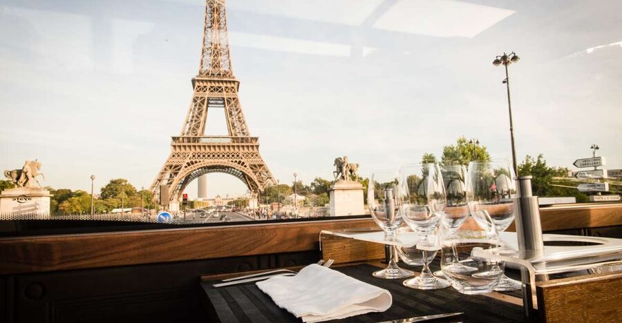 Paris: Bustronome Gourmet Dinner Tour - The gourmet bus setup, glass roof views, and table service