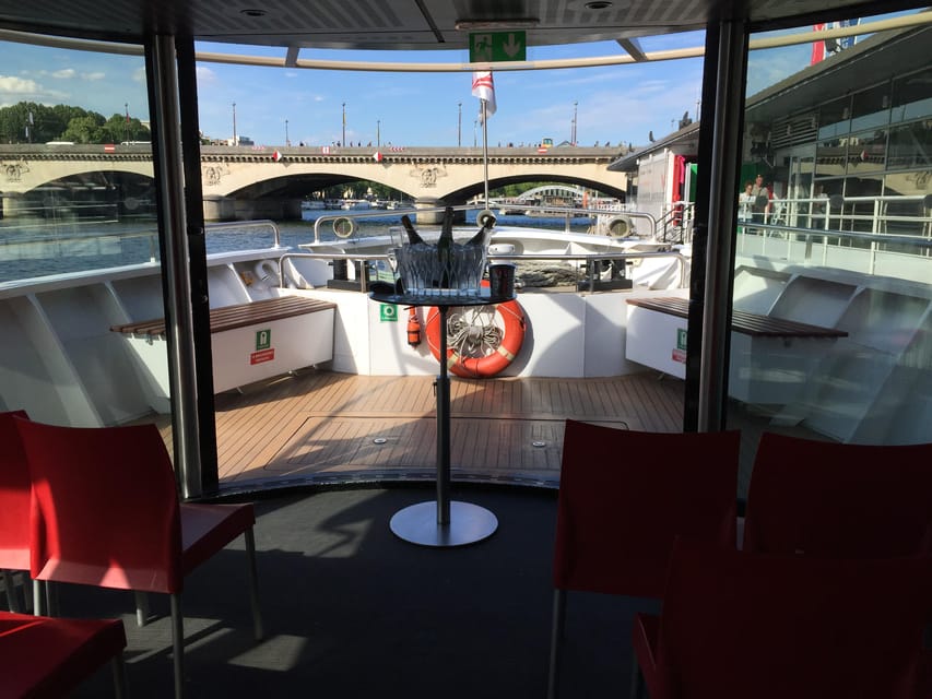 Paris: Champagne Tasting Cruise Departure from Eiffel Tower - Private Salon and Front-Deck Comfort on an All-Glass Boat