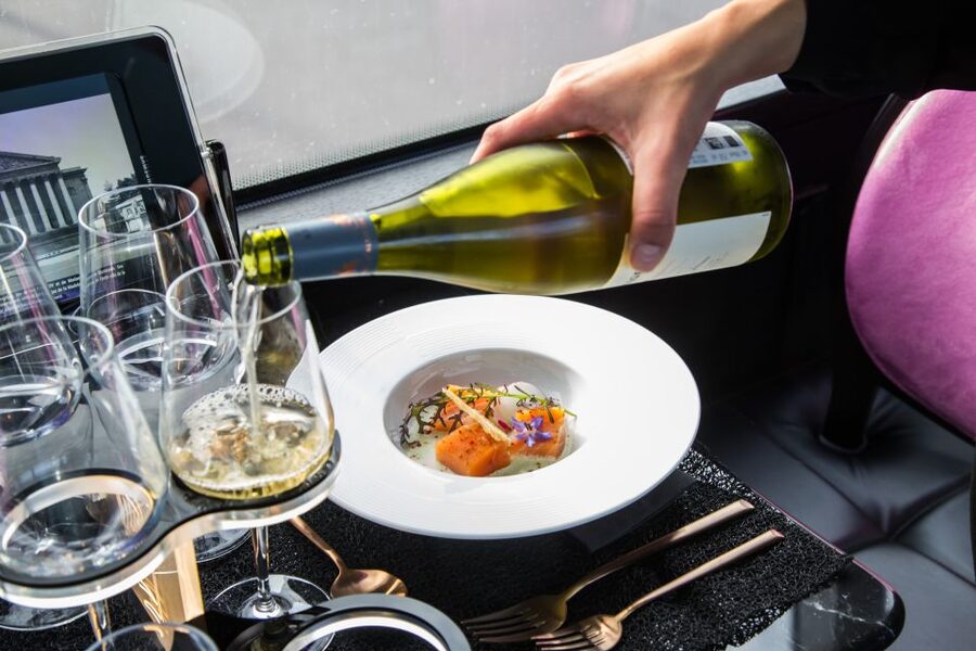 Paris: Champs Elysées Bus Toqué w/Lunch & Glass of Champagne - Price and value of a Bus Toqué lunch-and-sightseeing ticket