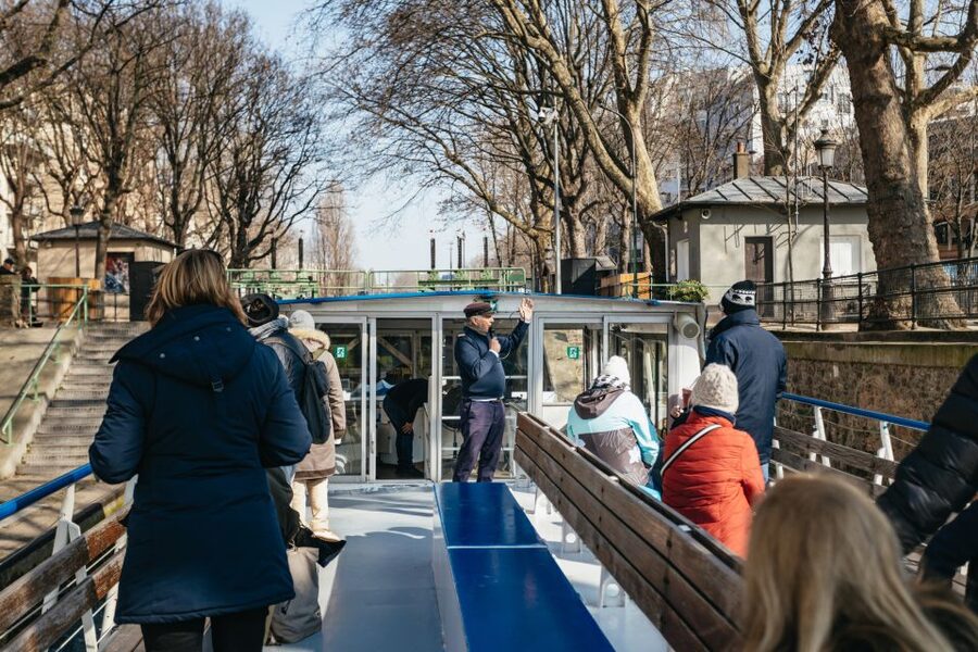 Paris: Cruise on the Saint-Martin Canal and Seine River - Canal Saint-Martin’s charm: bridges, chestnut trees, and the Hotel du Nord moment