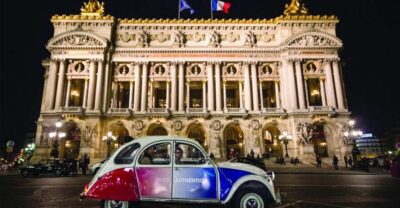 Discover Paris by Night in a Vintage Car with a Local