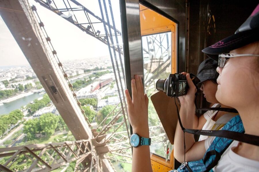 Paris: Eiffel Tower Tickets and City Bus Tour - Eiffel Tower elevator ride: what you get on the 2nd floor, and how the summit option changes things