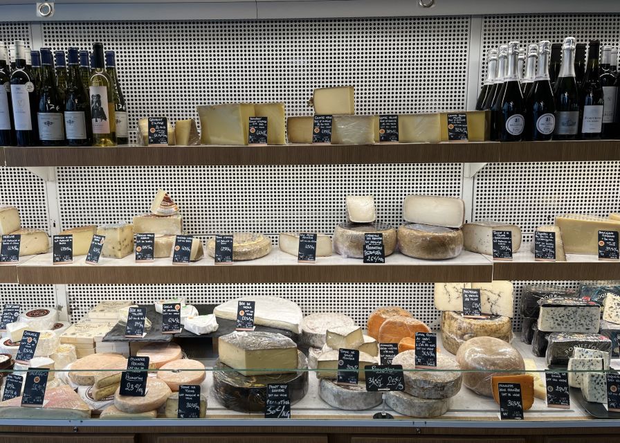 Paris: Guided Champagne & Food Tour in St-Germain-des-Pres - Five shop stops, six delicacies, and pairing that makes sense