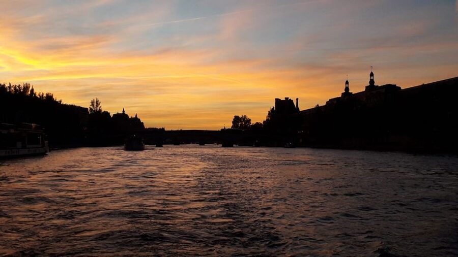 Paris: Happy Hour Evening Cruise on the Seine River - Getting on the boat near central Paris, and picking the best spot