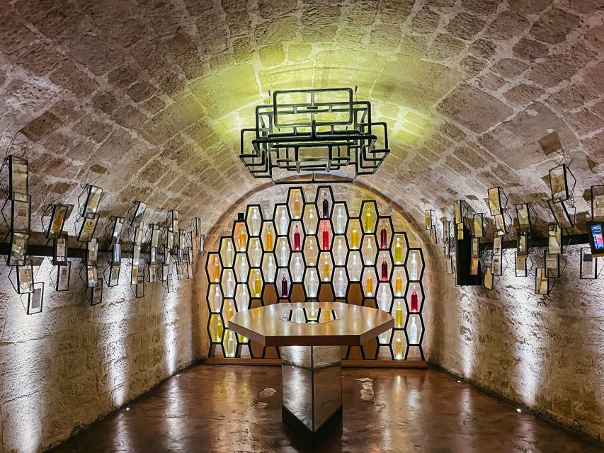 Paris: Les Caves du Louvre Guided Tour with Wine Tastings - Entering the 18th-century caves, your 5 senses get involved