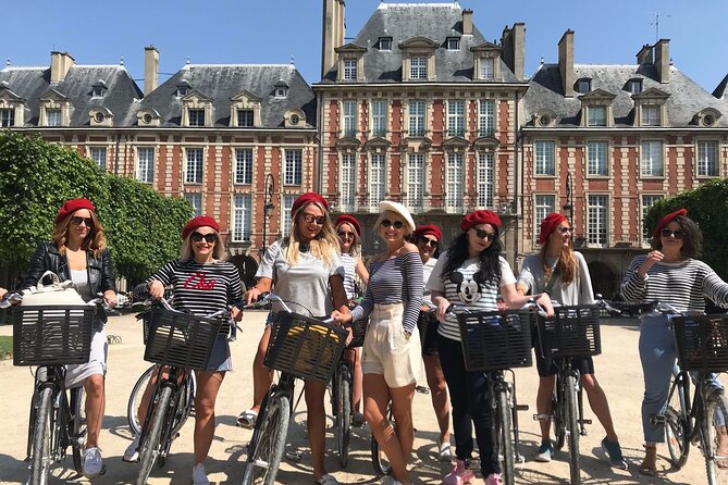 Paris Local Districts and Stories Off the Beaten Track Guided Bike Tour - Philip II Augustus Wall to Place des Vosges: Paris with layers
