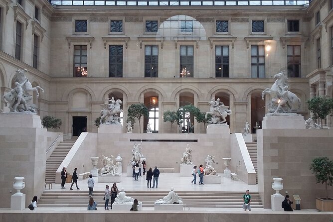 Paris: Louvre Museum Tour Mona Lisa & Iconic Masterpieces - Meeting Point at Kiosque des Noctambules: How Not to Get Swept Away