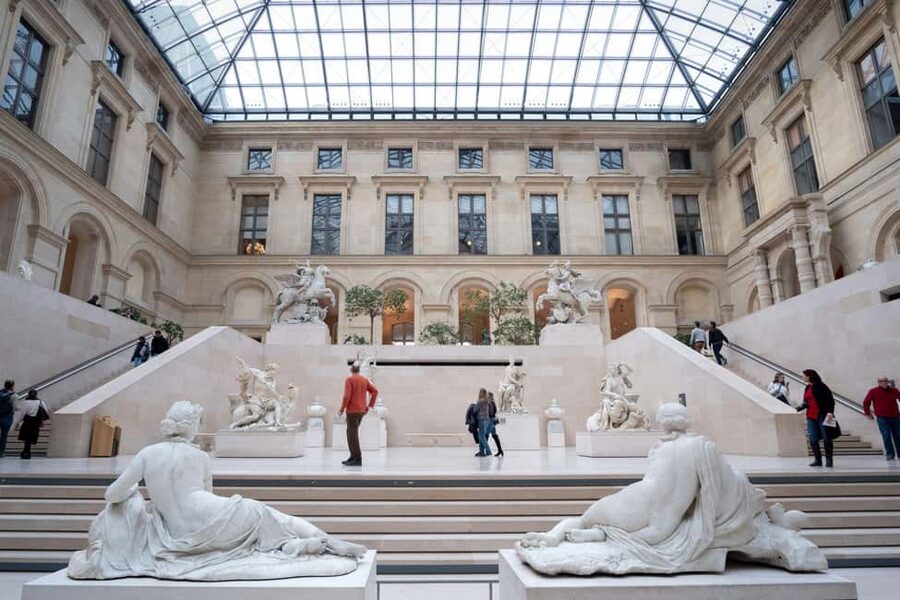 Paris: Louvre Overview, Exploration tour and Reserved Entry - Meeting at the Carrousel Arch: Find the Red Jacket and Paris City Vision Sign