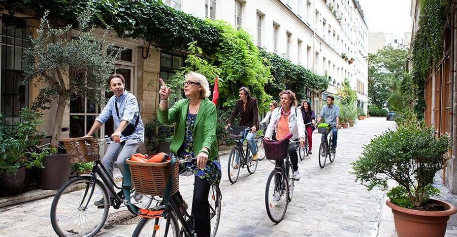 Paris Marais Bike Tour with Cheese & Sweet Tastings - The food game plan: cheeses, baguette, pastries, chocolates, and a drink