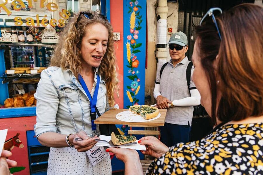 Paris: Montmartre Cheese, Wine & Pastry Guided Walking Tour - Place du Tertre and the artist square vibe